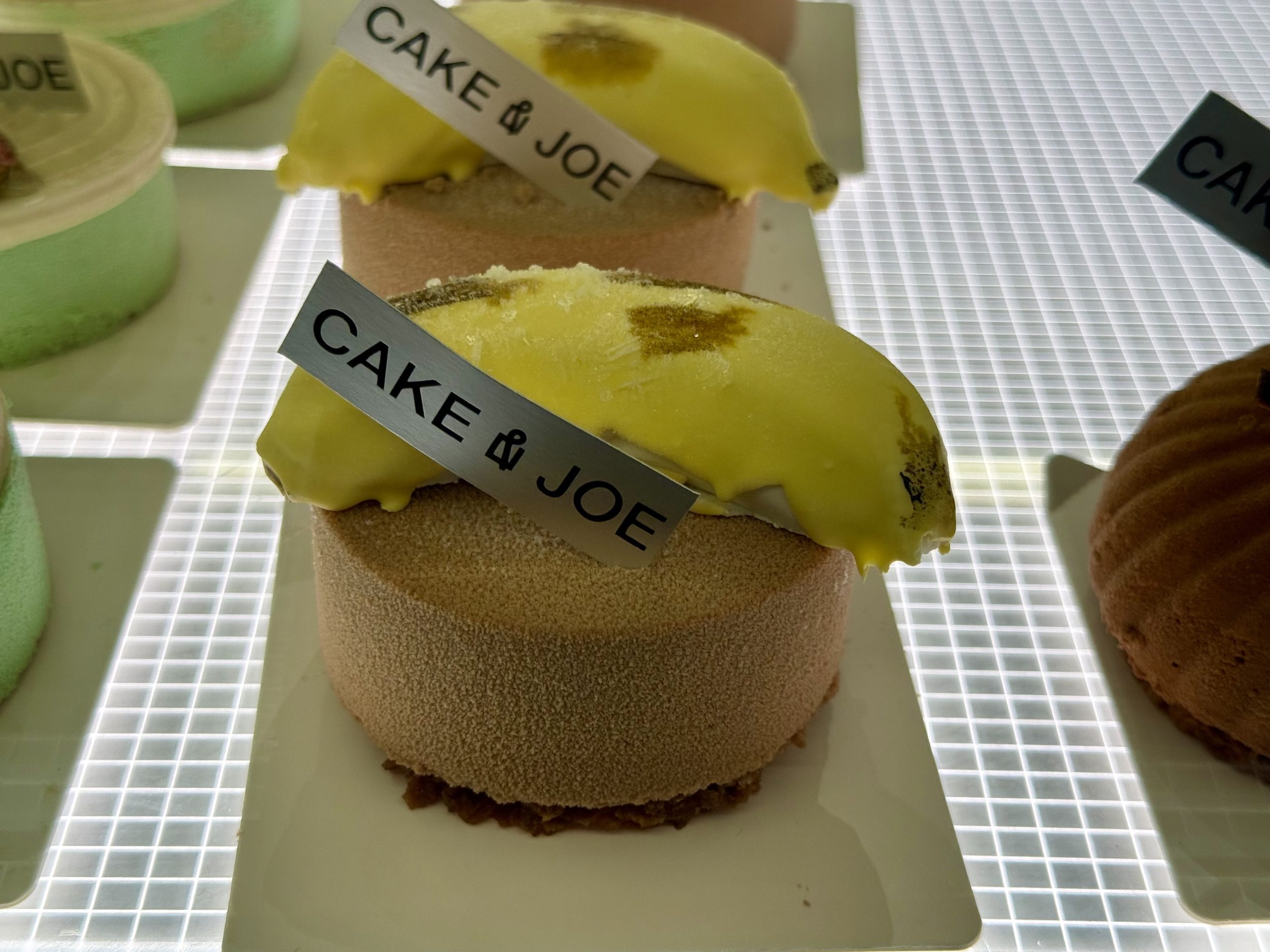 cake-joe-asian-mousse-desserts-display-case.jpg