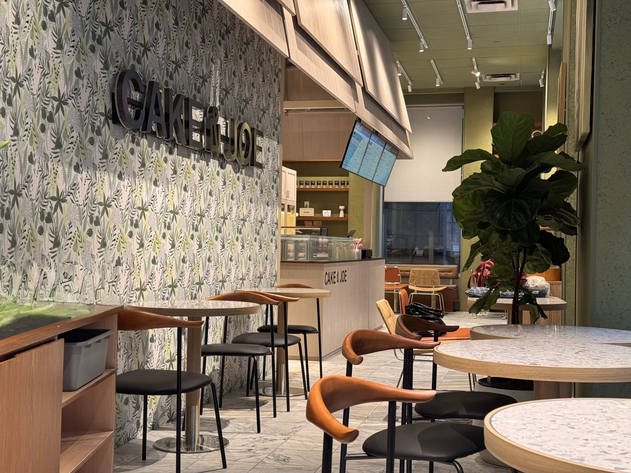 cake-joe-seating-area-botanical-wallpaper.jpg