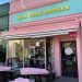 call-your-mother-pink-storefront-exterior-seating.jpg