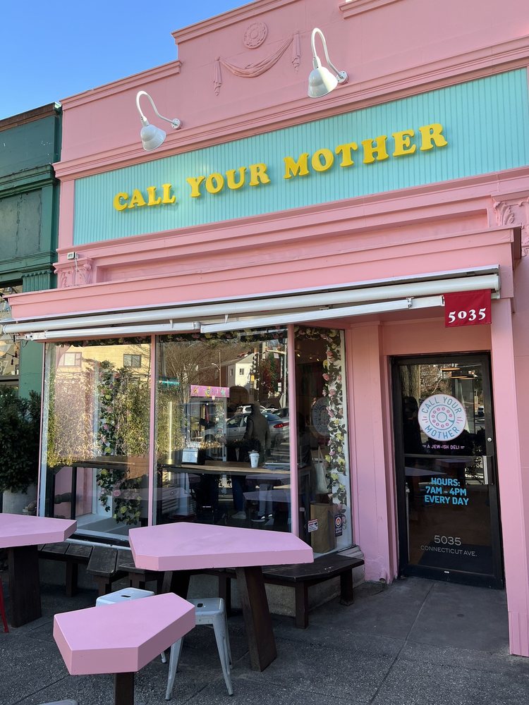 call-your-mother-pink-storefront-exterior-seating.jpg