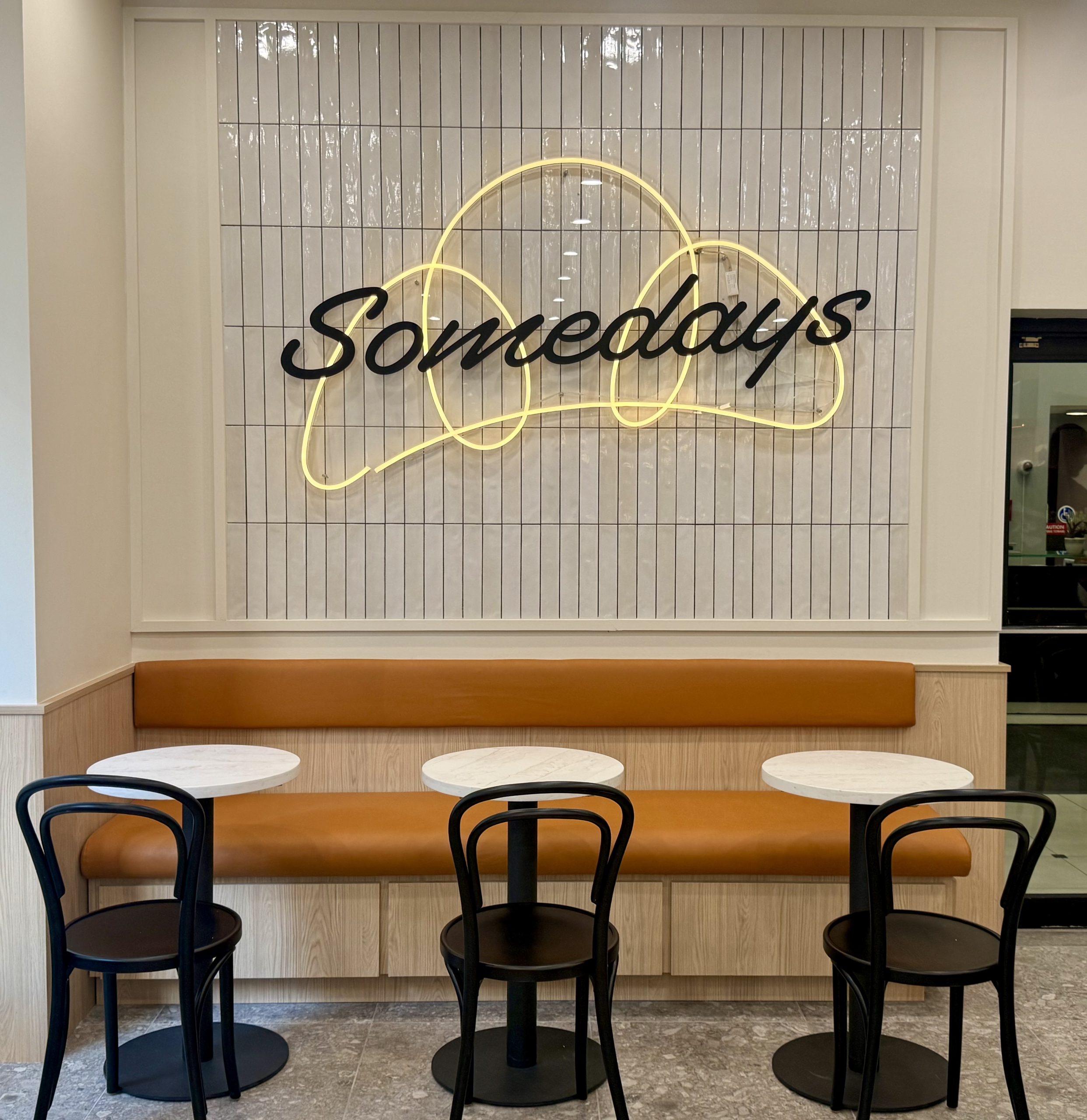 somedays-bakery-interior-neon-sign-seating